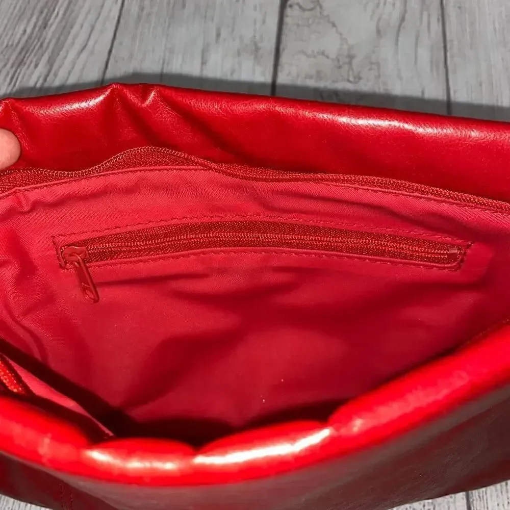 Clutch purse with wrist strap, zipper closure red